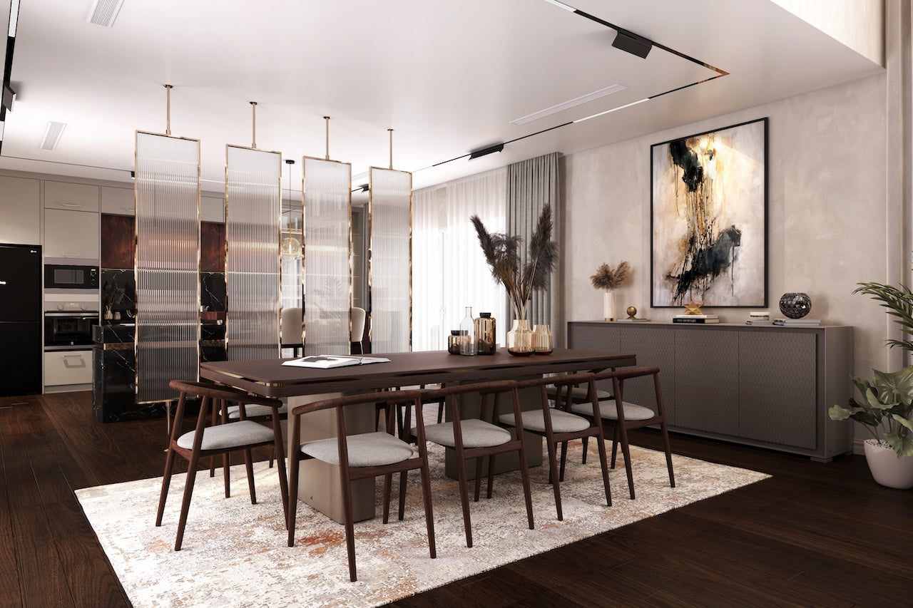 Modern dining room with a long wooden table and chairs, featuring a stylish rug and decorative elements.